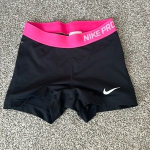Nike Pros with pink waist band